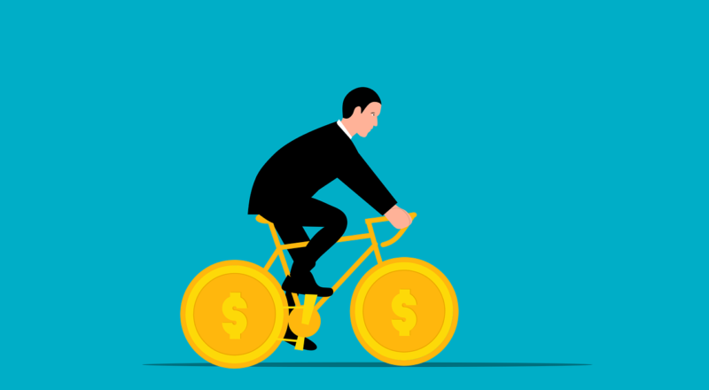 Homme faisant du vélo avec des roues en pièces